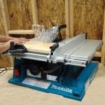 Makita 2705 10-Inch Contractor Table Saw cutting wood