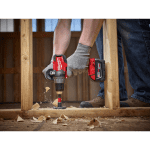 Milwaukee 2704-20 Hammer Drill drilling through wood