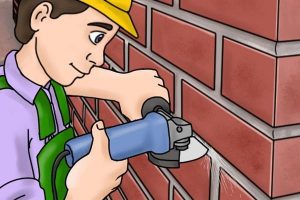 Removing brick mortar with an angel grinder.